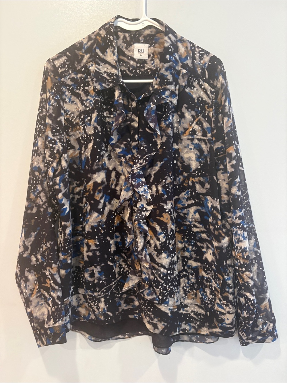 CAbi Black Abstract Ruffle Blouse with Blue and Tan Accents ptp 23 length 29